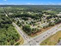 Aerial view of a neighborhood with houses and roads at 4115 Hicks Rd, Austell, GA 30106