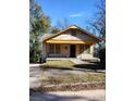 Nice bungalow with yellow accents and a cozy front porch at 1005 Ashby Ter, Atlanta, GA 30314