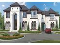 Luxury home with a large driveway, landscaping and three car garage at 1809 Trinidad, Stockbridge, GA 30281