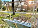 Peaceful lake view from a yard swing at 2646 Lakeshore Ne Dr, Conyers, GA 30012