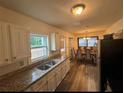 Kitchen features granite countertops and stainless steel sink at 286 Pauladean Se Cir, Marietta, GA 30067