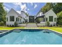 Luxury home with a large, inviting pool and backyard at 1235 Mount Paran Nw Rd, Atlanta, GA 30327