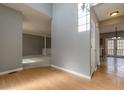 Bright entryway with hardwood floors and neutral walls at 2222 Baker Carter Dr, Loganville, GA 30052