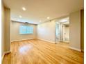 Spacious living room with hardwood floors and large window at 1501 Clairmont Rd # 1917, Decatur, GA 30033