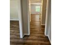 Hardwood floors and neutral walls lead into the home at 4670 Eberline Ct, Stone Mountain, GA 30083
