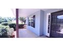 Front porch with door and window at 221 Bridgemill Ln, Hampton, GA 30228