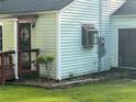 Light green house exterior with a well-maintained lawn at 939 Beecher Sw Ct, Atlanta, GA 30311