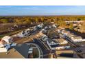 Aerial view of a new community with various houses and green spaces at 52 Spirea Way, Auburn, GA 30011