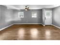 Bright and airy living room with hardwood floors and lots of natural light at 2653 Tilson Rd, Decatur, GA 30032