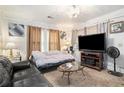 Living room with a sofa, love seat, and large TV at , Atlanta, GA 30318