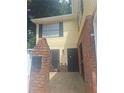 Tan siding two-story home with brick accents at 1847 Whitehall Forest Se Ct, Atlanta, GA 30316