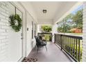 Inviting front porch with seating and greenery at 976 Washington St, Atlanta, GA 30315