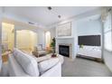 Spacious living room with fireplace and hardwood floors at 1735 Peachtree Ne St # 321, Atlanta, GA 30309