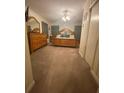 Spacious main bedroom with carpeted floor and wooden furniture at 3749 Centerville Rosebud Rd, Snellville, GA 30039