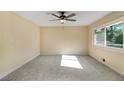 Bright bedroom with ceiling fan and neutral carpeting at 3271 Mayflower Dr, Marietta, GA 30066