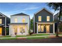 Row of new homes with craftsman style and front porches at 589 Federal Se Ter, Atlanta, GA 30315