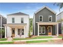 Row of new homes with craftsman style and front porches at 589 Federal Se Ter, Atlanta, GA 30315