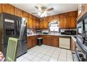 Kitchen with wood cabinets, stainless steel appliances, and tile floor at 3542 Lynfield Sw Dr, Atlanta, GA 30311