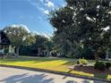 Residential community with manicured lawns and trees at , Atlanta, GA 30318