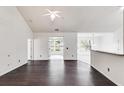 Spacious living room with dark hardwood floors and high ceilings at 5501 Somer Ridge Ct, Douglasville, GA 30134