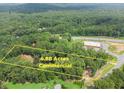 4.88 acres of commercial land near highway with wooded surroundings at 2841 Upper Sweetwater Se Trl, White, GA 30184