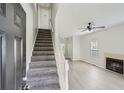 Front entry with gray carpeting and stairs leading upstairs at 2259 Sisk Nw St, Atlanta, GA 30318