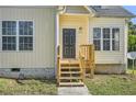 House exterior showcasing front steps and door at 2259 Sisk Nw St, Atlanta, GA 30318