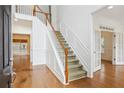 Elegant staircase leading to the second floor at 295 Vickery Way, Roswell, GA 30075