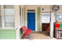 Back porch with blue door and red stadium seats at 79 Hammock Pl, Atlanta, GA 30312