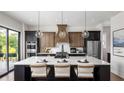 Modern kitchen with stainless steel appliances and large island at 3012 Sunset Pass, Canton, GA 30114