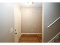 Spacious entryway featuring wood-look floors and neutral walls at 707 Arbor Hill Dr, Stone Mountain, GA 30088