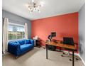 Home office with a blue velvet couch and large desk at 3435 Kingsboro Ne Rd # 1201, Atlanta, GA 30326