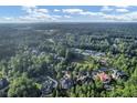 Community overview showcasing homes, tennis courts, and lush greenery at 4317 Oglethorpe Nw Loop, Acworth, GA 30101
