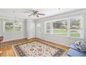 Spacious living room with hardwood floors and large windows at 107 Gladstone Sw Dr, Marietta, GA 30060