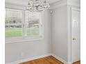 Simple dining area with hardwood floors and neutral colors at 107 Gladstone Sw Dr, Marietta, GA 30060