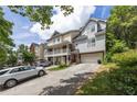 Townhomes with attached garages and landscaping at 581 Cooper Sw St, Atlanta, GA 30312