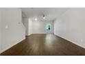 Bright living room showcasing wood-look floors and a ceiling fan at 2136 Chadwick Sw Rd, Atlanta, GA 30331