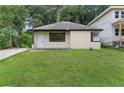Newly renovated bungalow with a charming front yard at 1410 Elizabeth Sw Ave, Atlanta, GA 30310