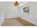 Bright and airy bedroom with wood-look flooring at 1410 Elizabeth Sw Ave, Atlanta, GA 30310