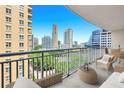 Balcony with city views and seating area at 3338 Peachtree Ne Rd # 1106, Atlanta, GA 30326