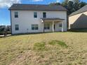 Spacious backyard with a covered patio at 4430 Vernon Nw St, Lilburn, GA 30047