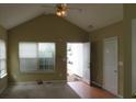 Spacious living room with vaulted ceiling and access to backyard at 435 Victoria Blvd, Oxford, GA 30054