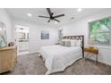 Main bedroom with plush carpet and en-suite bathroom at 2581 Hood Nw Ave, Atlanta, GA 30318