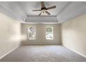 Spacious main bedroom with ceiling fan and carpet at 4024 Waldrop Hills Dr, Decatur, GA 30034