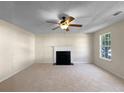 Living room with fireplace and carpet at 4024 Waldrop Hills Dr, Decatur, GA 30034