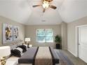 Main bedroom with vaulted ceilings and plenty of natural light at 1054 Valley Rock Dr, Lithonia, GA 30058