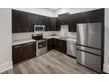 Modern kitchen with stainless steel appliances at 745 Fountainhead Ne Ln # 113, Atlanta, GA 30324