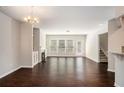 Living room with dark hardwood floors and a built in fire place at 3732 Upland Dr, Mcdonough, GA 30253