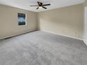 Spacious bedroom with carpeted floor and ceiling fan at 707 Pine Tree Trl # 10B, Atlanta, GA 30349