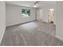 Spacious bedroom with grey carpet and an ensuite bathroom at 4221 Inverness Rd, Duluth, GA 30096